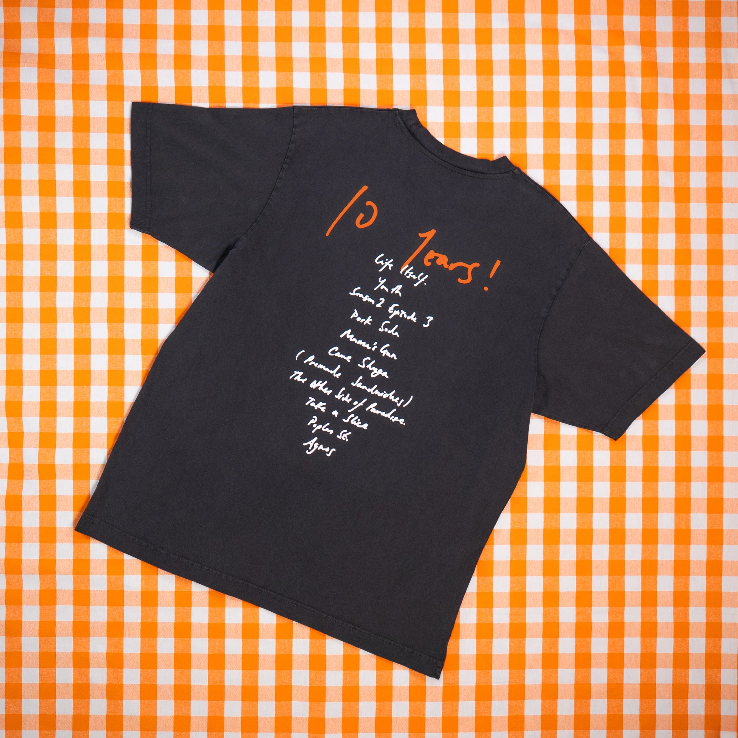 How To Be A Human Being Black Relaxed Fit Tee Back on background
